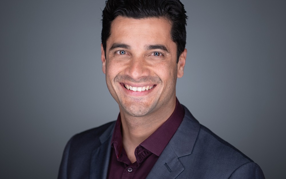 Strong corporate headshot with eye contact and intent, in Sydney studio
