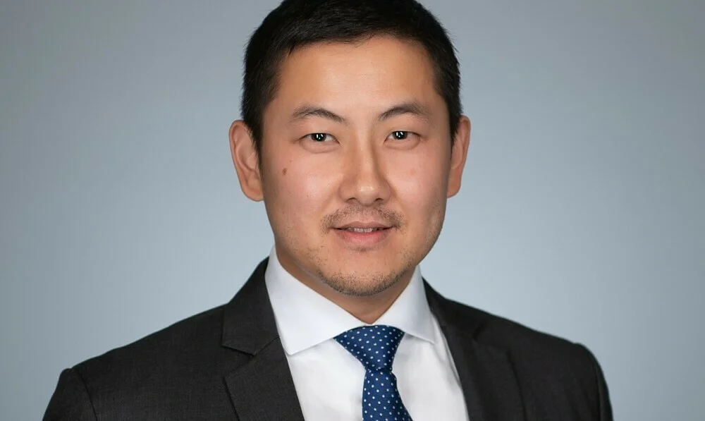 Asian male in business headshot in Sydney studio